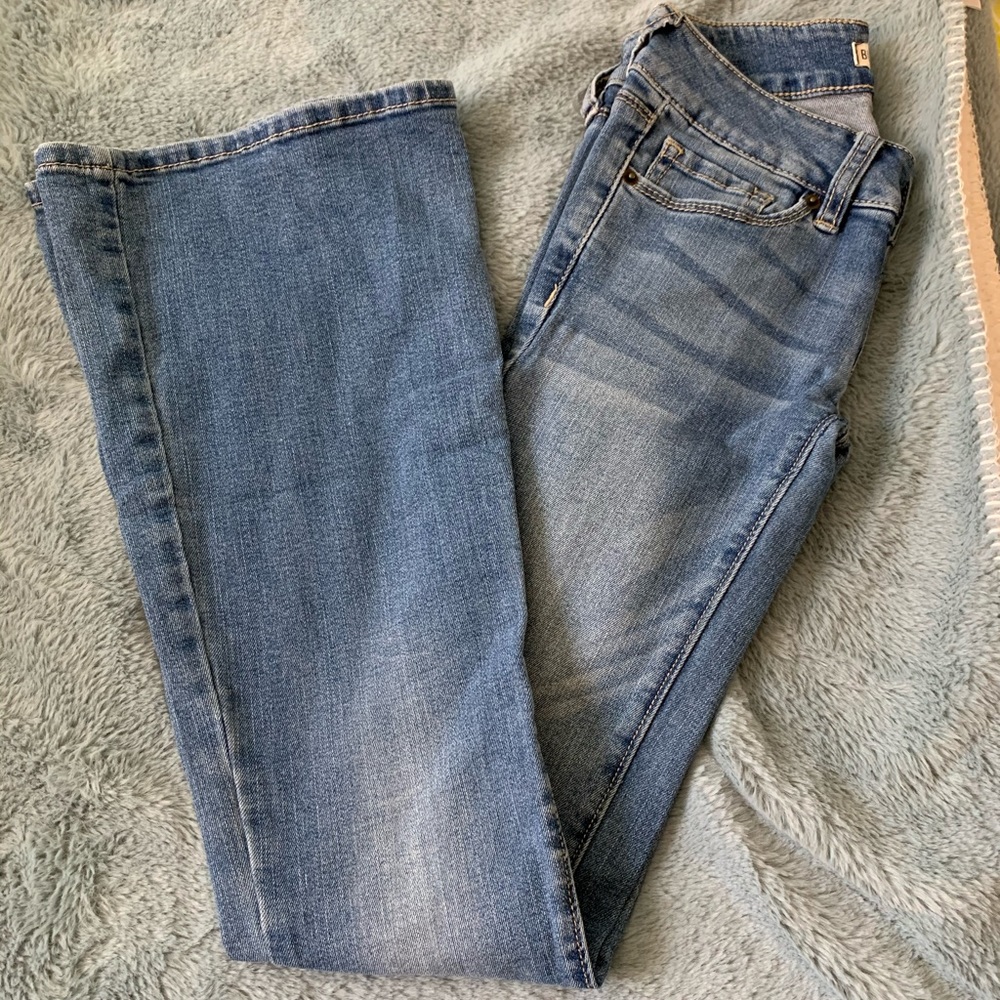 Low rise medium wash flare bottom jeans
